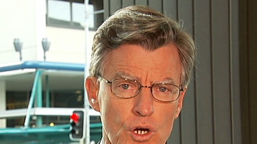 The Opposition says the current Education Minister Geoff Wilson (pictured) opened Mr McKennariey's new office in 2005.