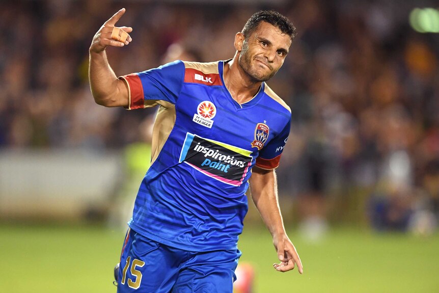 Andrew Nabbout celebrates a goal for Newcastle Jets