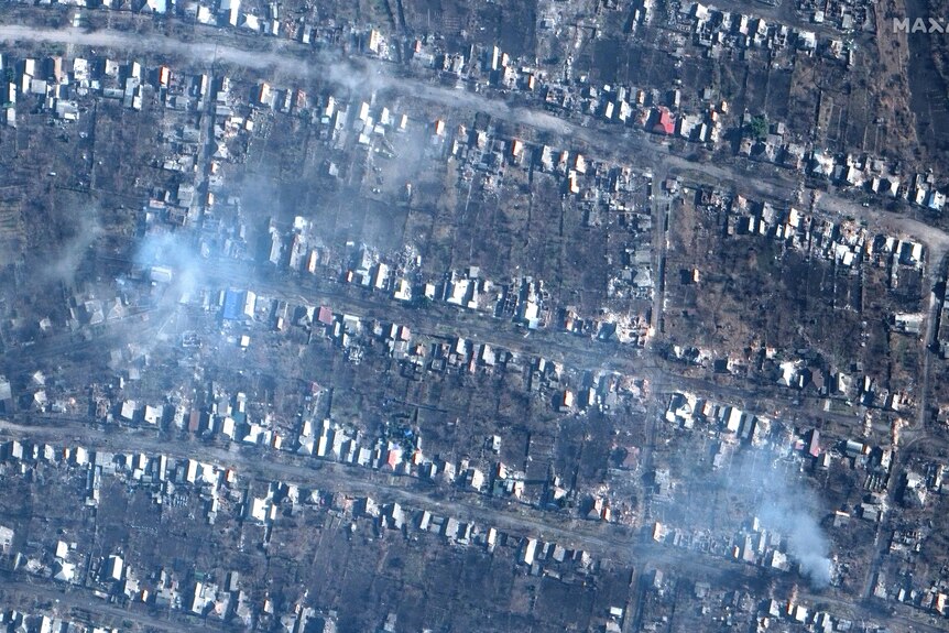 This satellite image provided by Maxar Technologies shows burning and destroyed buildings in Bakhmut.