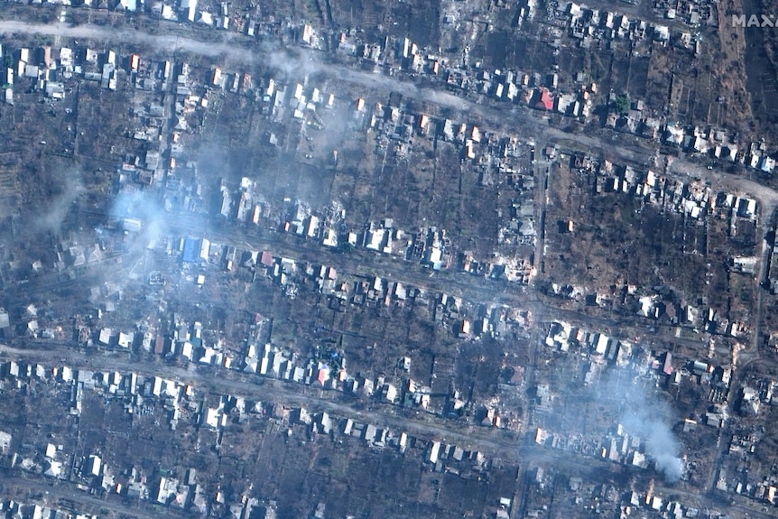 This satellite image provided by Maxar Technologies shows burning and destroyed buildings in Bakhmut.