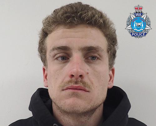 A police supplied photo of a 30-year-old man with brown hair.