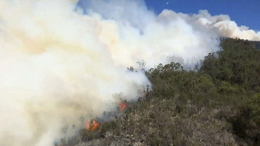Flames burn up a ridge at in northern Tasmania