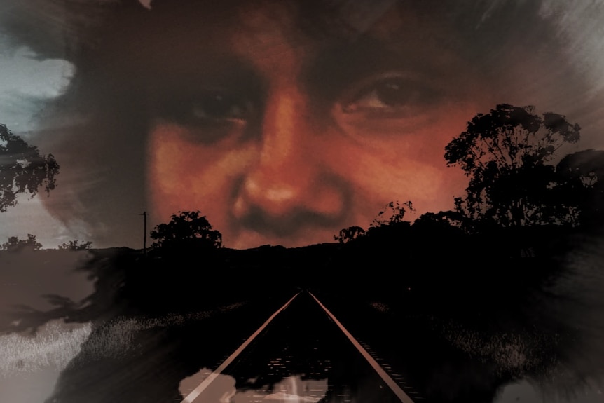 A graphic of a photo of a teenage boy against train tracks image
