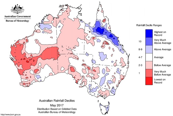 a map of Australia showing red patches indicating dryness and blue patches indicating wetness