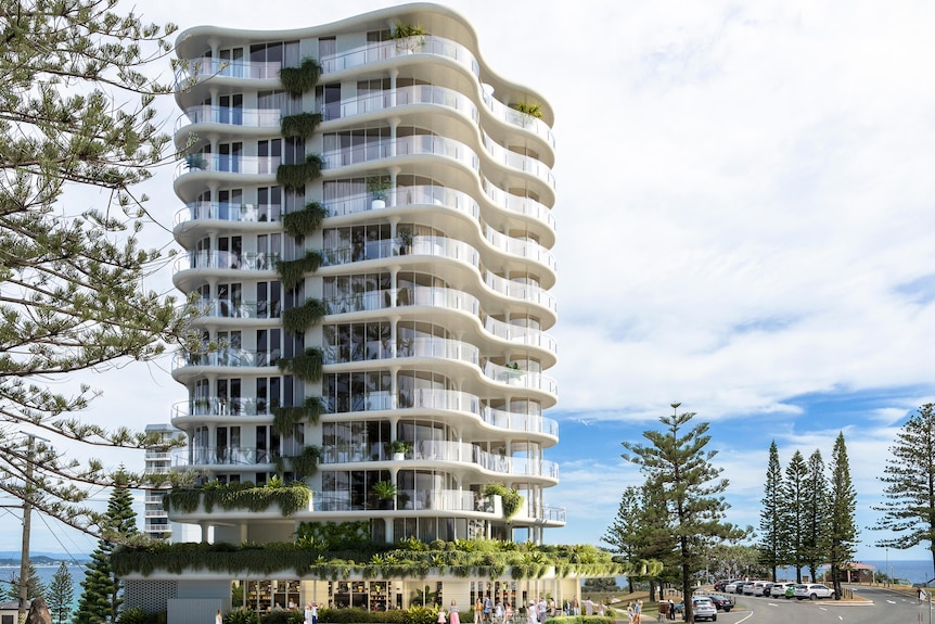 An artist's rendition of an apartment building on a hill overlooking the ocean.