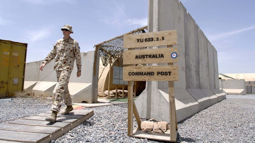 An Australian soldier leaves the control and reporting centre in Kandahar, Afghanistan