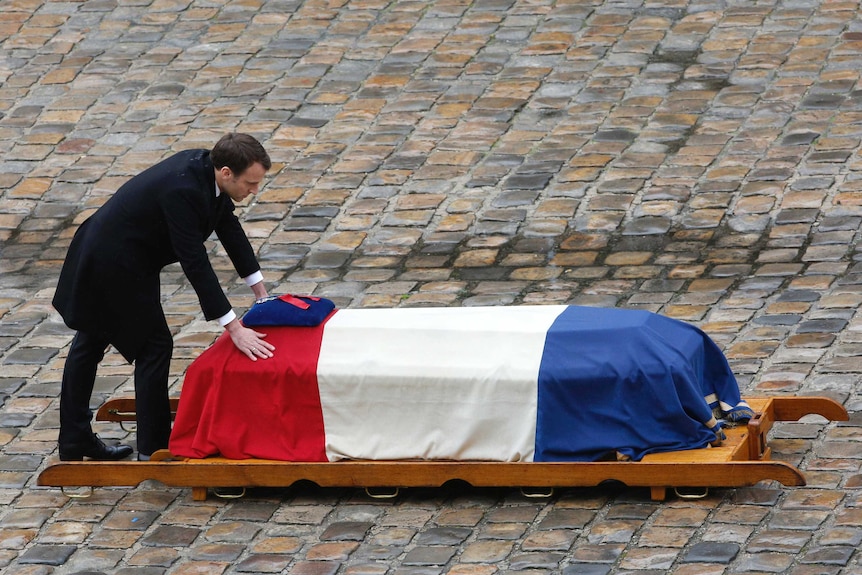 Showing how heavy the burden of the office of French President can be.