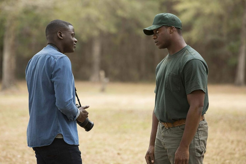 Daniel Kaluuya and Marcus Henderson in a scene from Get Out (2017).