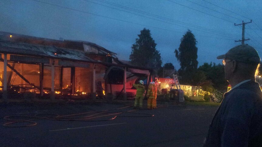 Fire destroys the original Coles store at Wilmot, Tasmania.