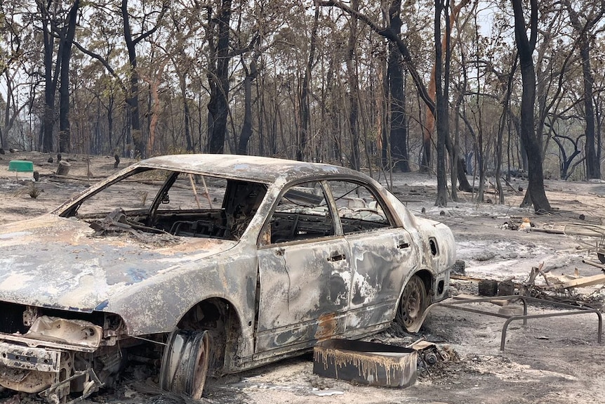A burnt-out car on Ms Spedding's property.