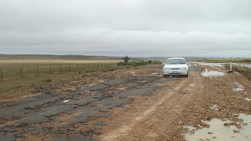 Flood-damaged road