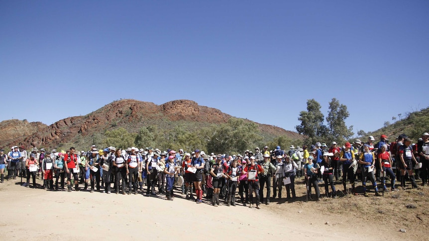 Competitors line up at starting line