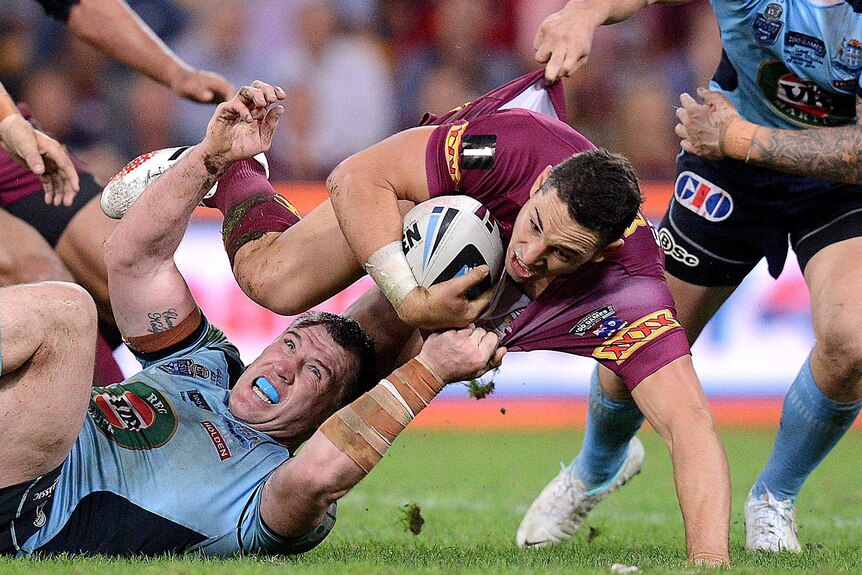 Paul Gallen tackles Billy Slater during Game One of the 2014 State of Origin series at Lang Park.