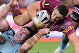 Paul Gallen tackles Billy Slater during Game One of the 2014 State of Origin series at Lang Park.