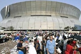 Thousands of Hurricane Katrina survivors wait to be evacuated from the Superdome in New Orleans