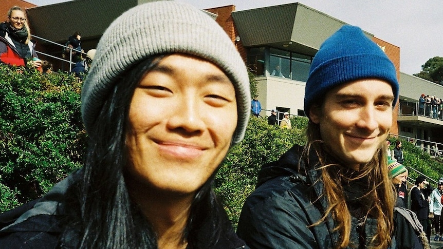 Eugene Yang and friend wearing beanies for story about dating as an Ausian Australian man.