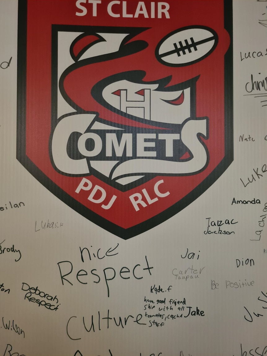 Things like "nice", "respect" and "culture" are written on a whiteboard