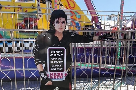 A cutout of Michael Jackson promoting a Royal Adelaide Show ride.
