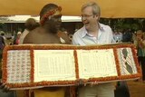 Galarrwuy Yunupingu presents Kevin Rudd with the petition.