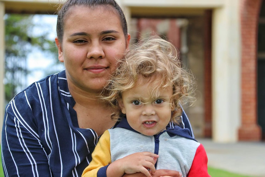 Christal Quartermaine with her son.