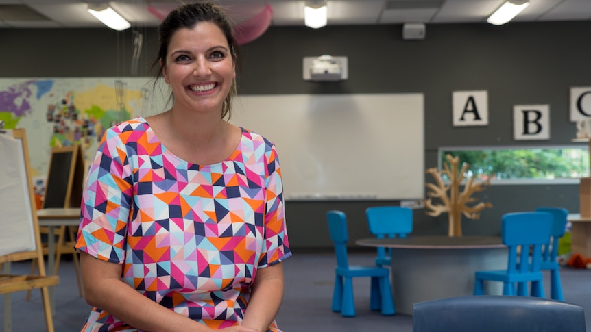 Anita Camporeale sits in the classroom.