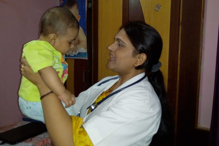 Dr Dipali Singh with her child