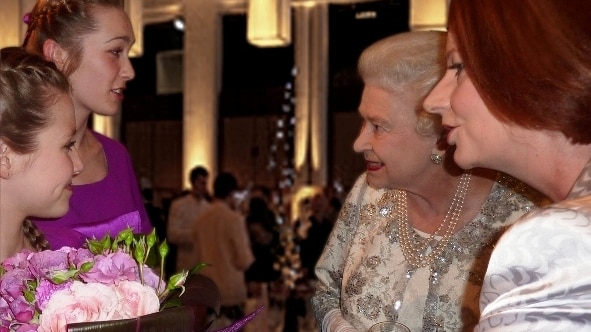 A photo of Charli Moore meeting Queen Elizabeth II and Julia Gillard after performing in the Australia Girls Choir