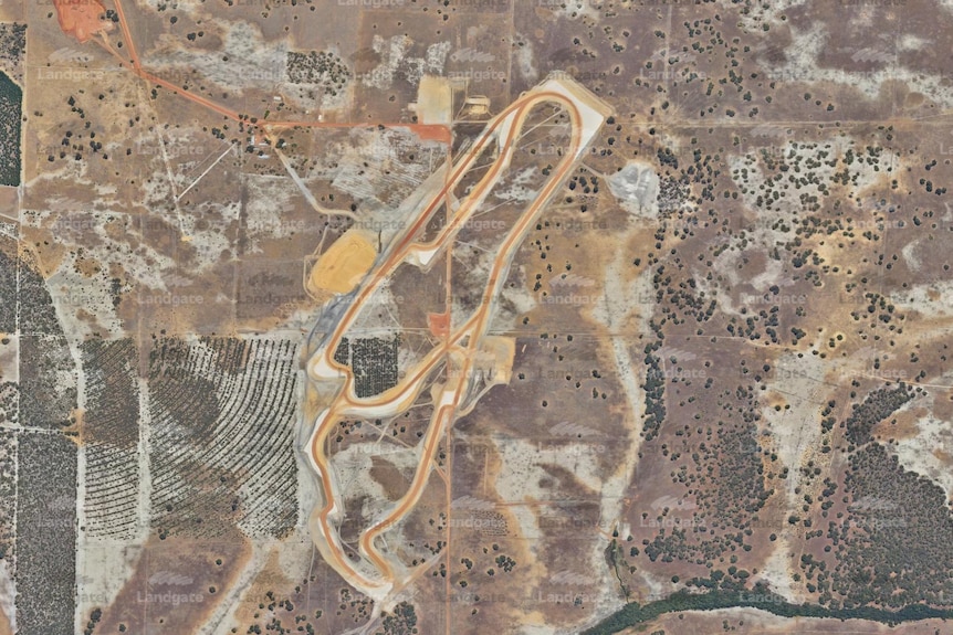 A partially constructed gravel race track seen from the air