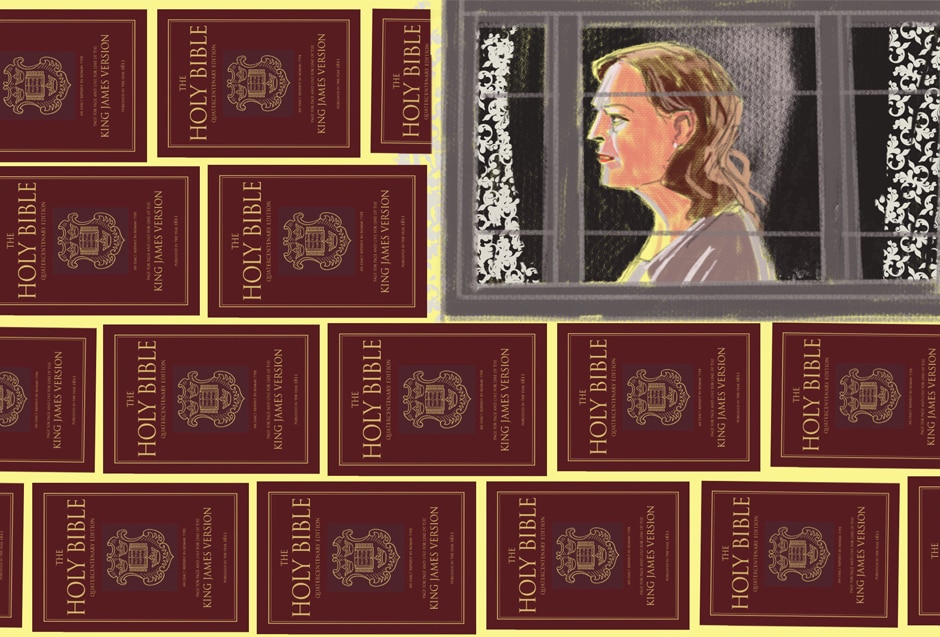 A woman sits in a window, surrounded by bibles.