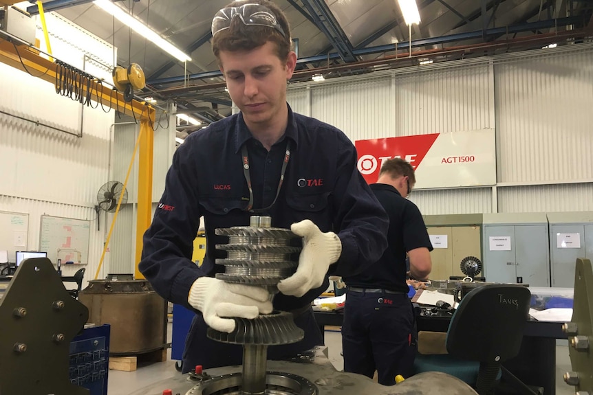 Lucas Keegan rebuilding an engine at TAE