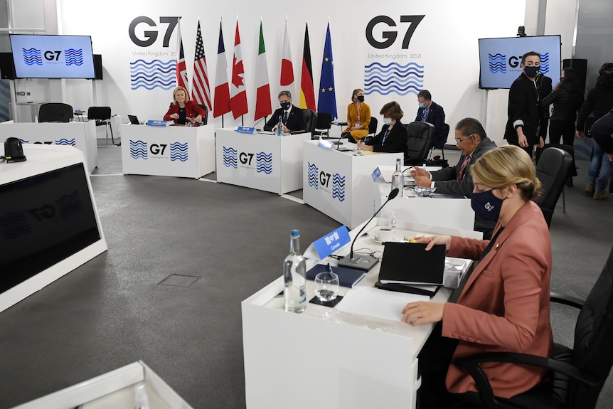 G7 foreign ministers seated at summit