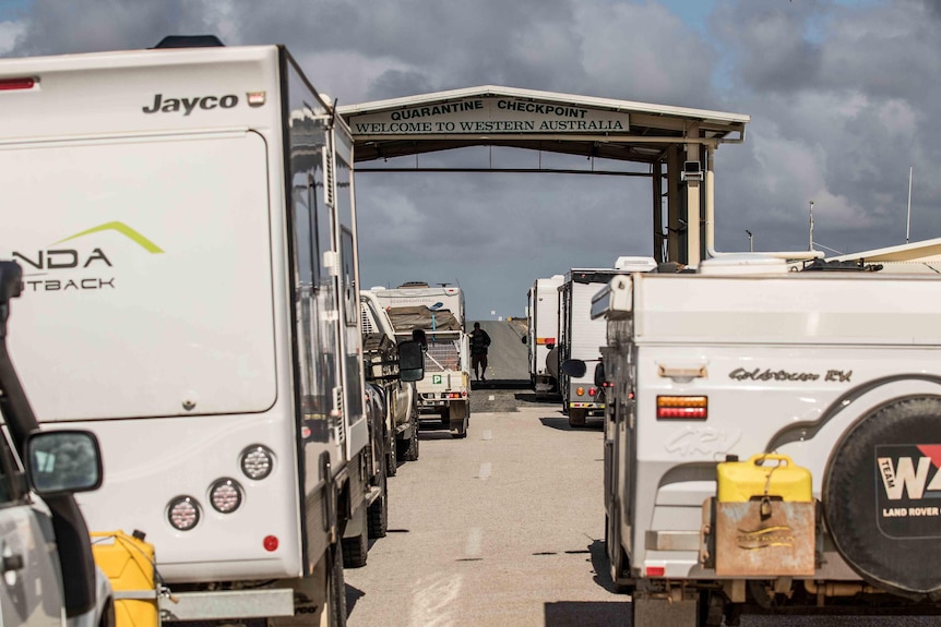  A queue of caravans waiting to pass a checkpoint