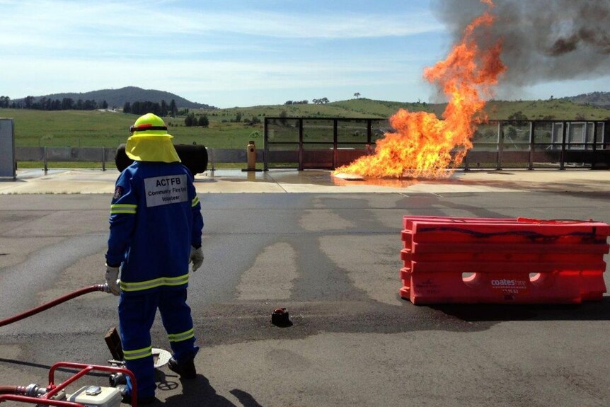 Volunteer fire fighters at a training day at the Emergency Services Agency training centre at Hume, ACT.