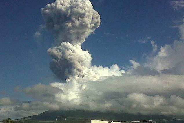 Smoke and ash spews from Mayon Volcano