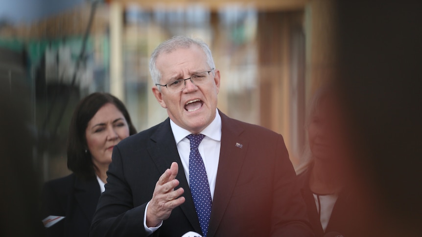 Scott Morrison speaks at an outdoor press conference.