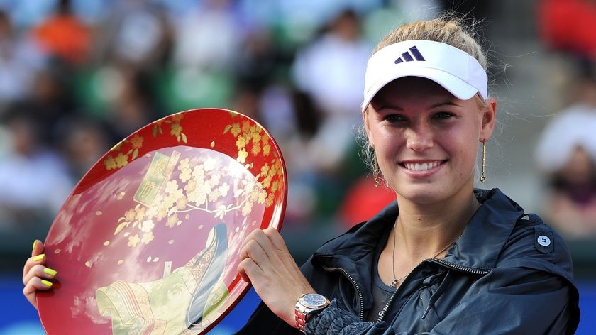 Basking in Tokyo glory ... Wozniacki recovered to win in three sets.