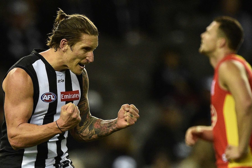 Jesse White celebrates a goal against Gold Coast