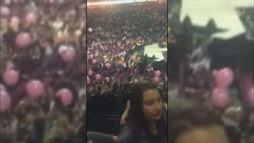 People flee concert venue after 'explosion' at Manchester Arena