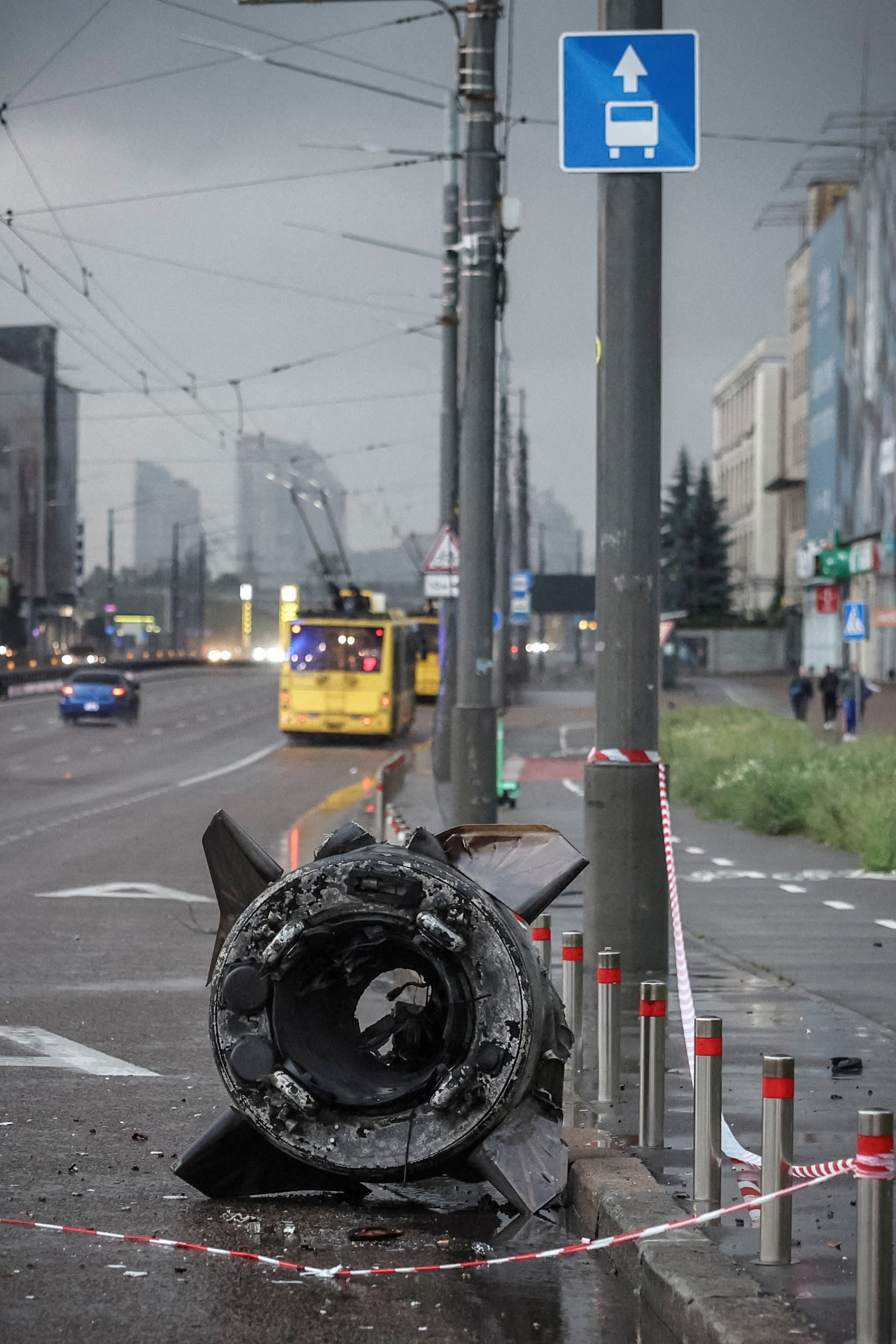 A piece of a missile on a street.