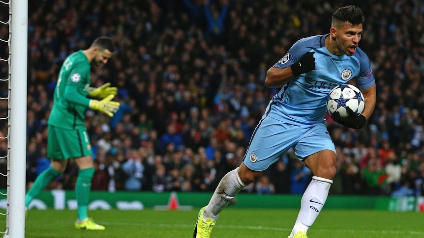 Sergio Aguero celebrates after scoring for Manchester City against Monaco in the Champions League