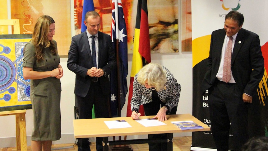 Officials from the ACT Government, ACT Public Service and ATSEIB sign the agreement.