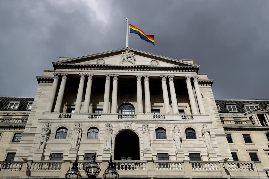 The rainbow flag flies above the Bank of England to celebrate the unveiling of the new 50-pound note in London.