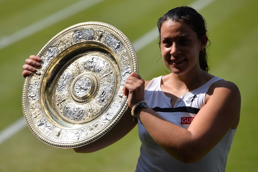 Marion Bartoli with her Wimbledon trophy