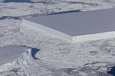 The icebergs sharp edges and flat surface suggests it only recently broke off the ice shelf.