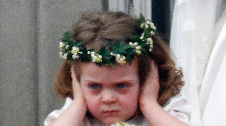 Bridesmaid Grace van Cutsem closes her ears