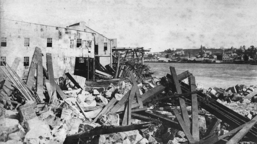 Debris around Pettigrew's Mill yard, William Street, Brisbane, in the wake of the 1893 flood