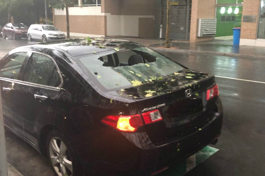 A car wish a smashed back window