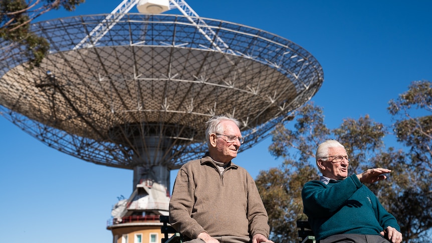 David Cooke and Ben Lam sitting near Parkes Observatory