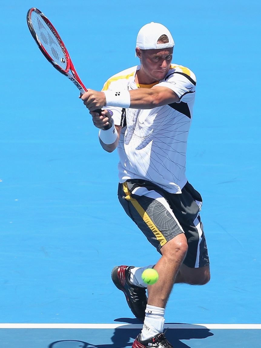 Into the final ...  Lleyton Hewitt powered past Tomas Berdych in straight sets.