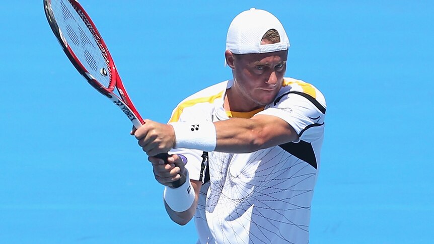 Into the final ...  Lleyton Hewitt powered past Tomas Berdych in straight sets.